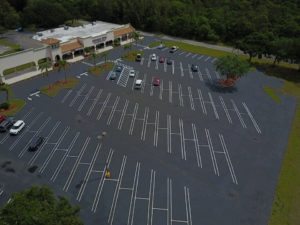 Asphalt Sealcoating: What Are the Pros and Cons of Asphalt Sealing? florida hobe sound sealcoating